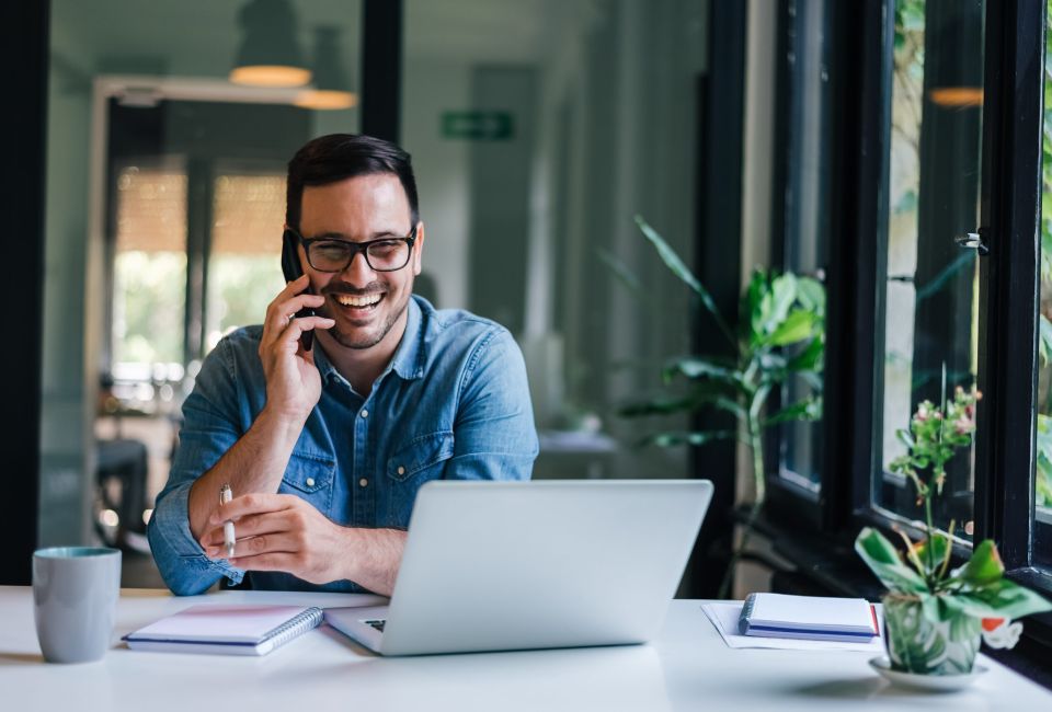 happy client on phone