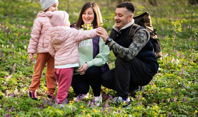 young family picking flower