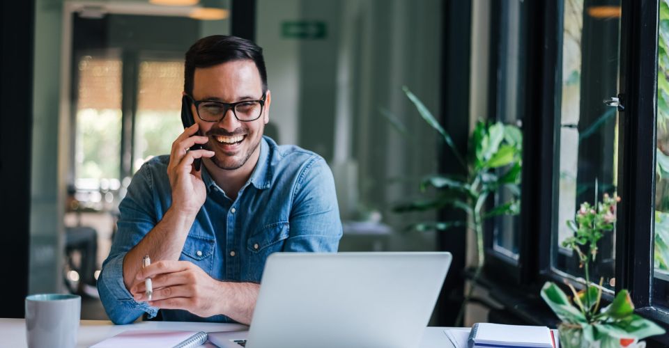 happy client on phone