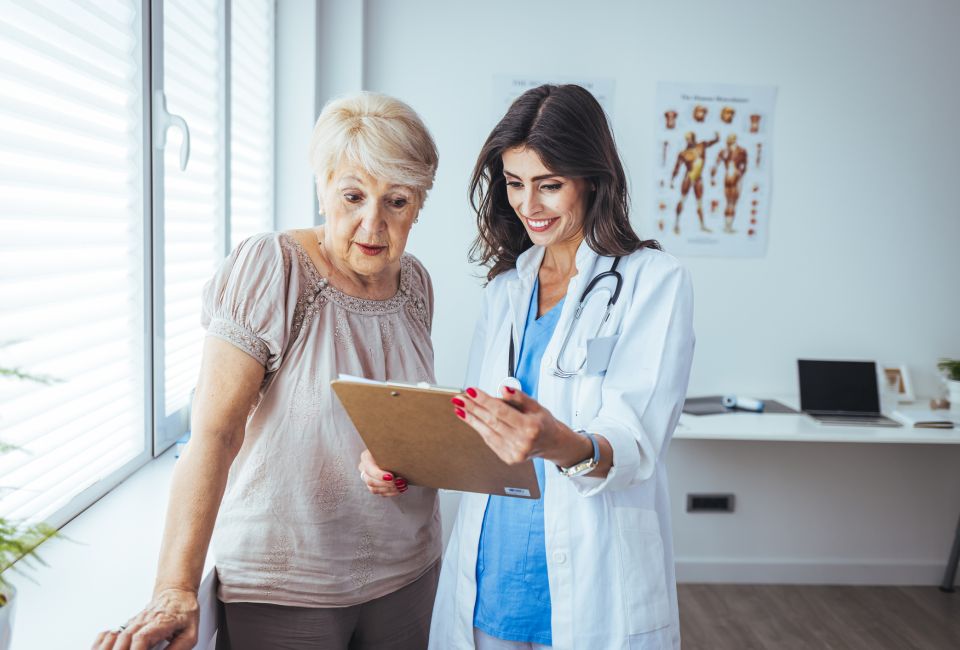 woman looking at clipboard