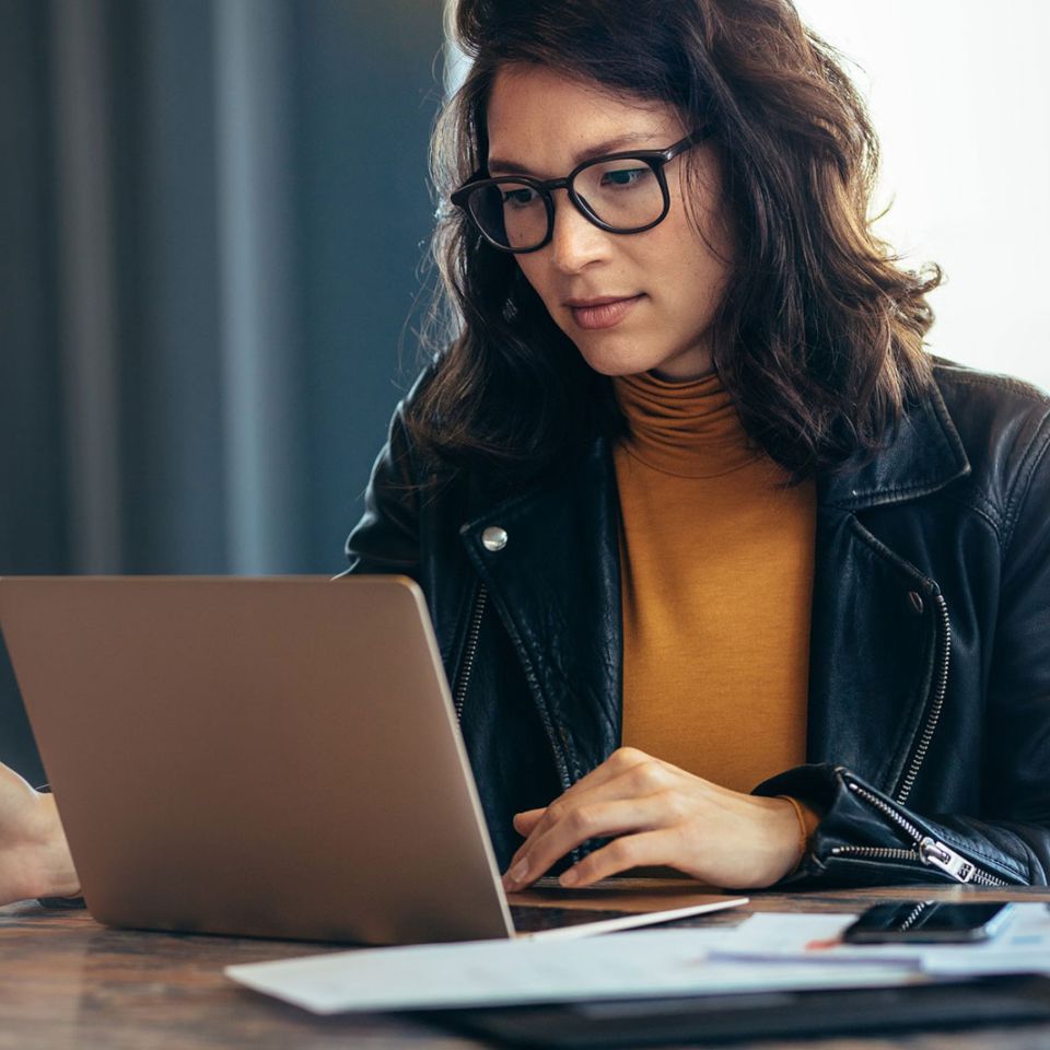 woman looking at pc