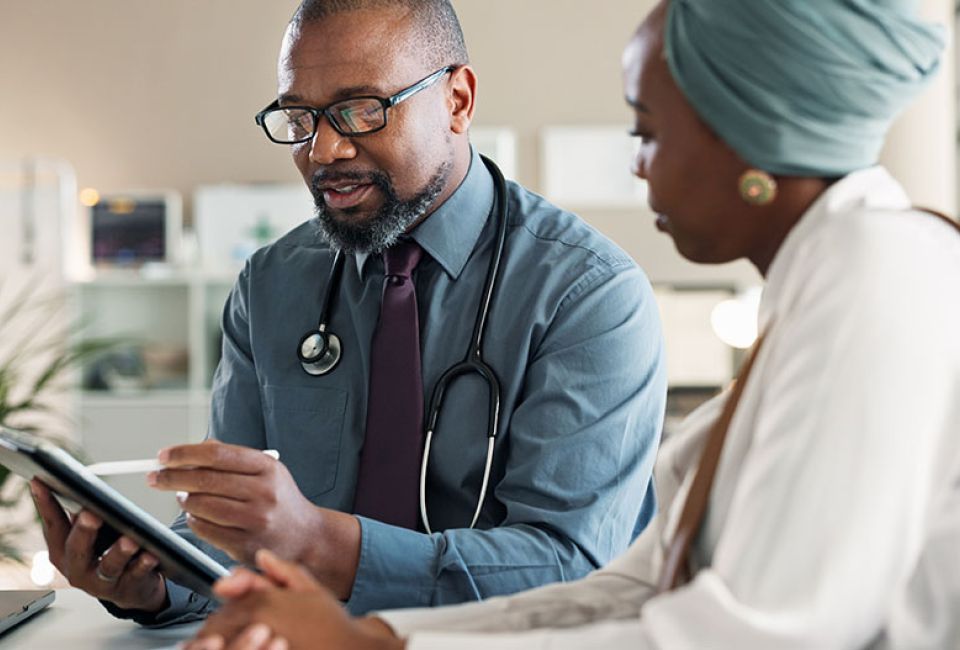 doctor speaking with patient