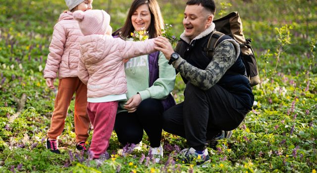 young family picking flower