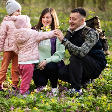 young family picking flower
