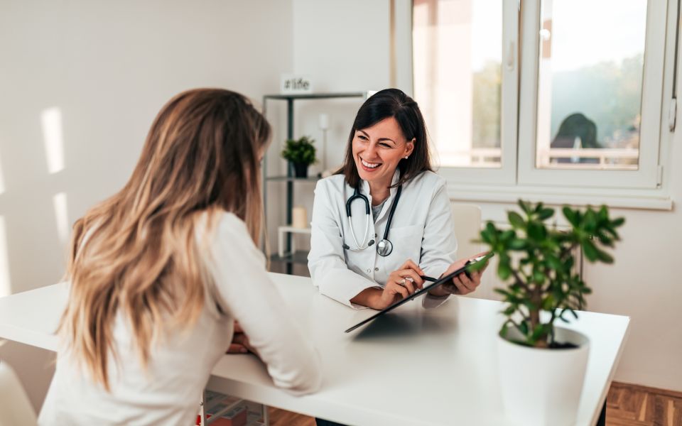 woman meets female doctor