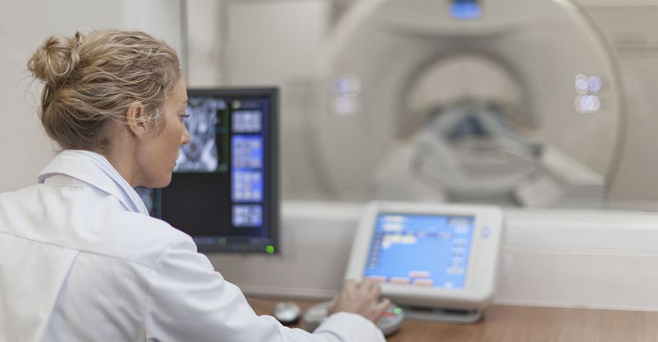 Medical employee working on device