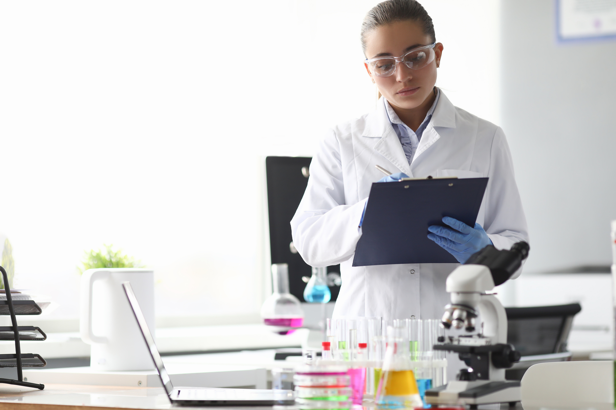 Scientist completing documents in laboratory